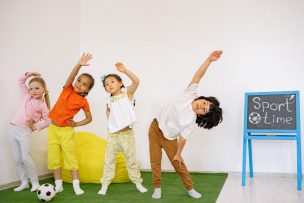 active kids doing bending exercise